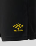 Close-up of black shorts fabric with yellow Umbro diamond logo embroidery