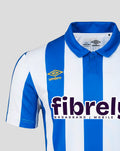 Close-up of collar and chest on the Sheffield Wednesday home shirt showing blue and white stripes and the SWFC crest