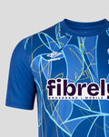 Chest view of blue junior goalkeeper shirt showing Umbro logo and fibrel sponsor across the front