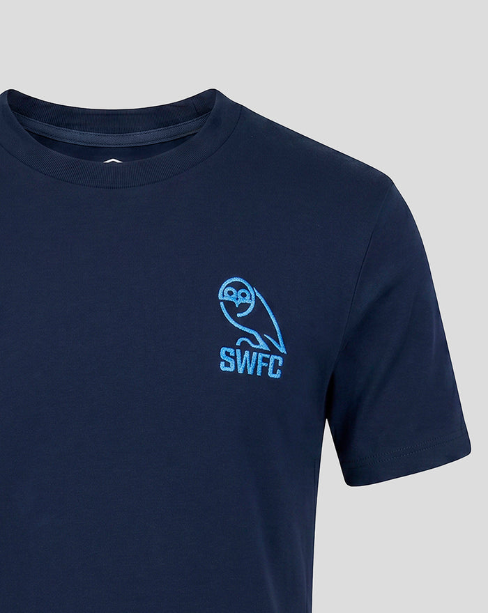 Front close-up showing SWFC crest embroidery and Umbro logo on a navy tee