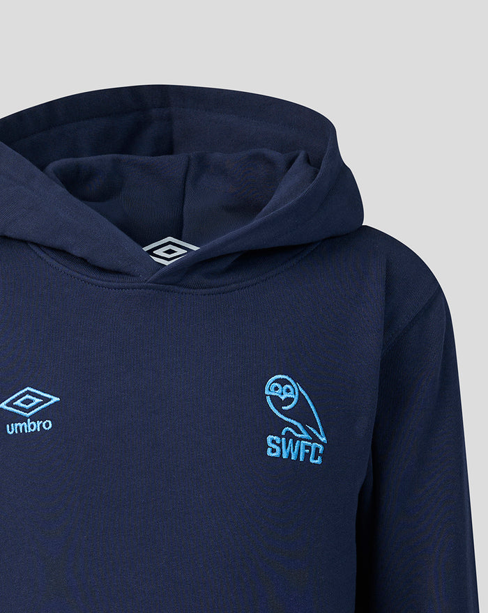 Close up of the hoodie chest area with Umbro logo on the left and SWFC crest on the right.