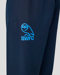 Close-up of the light blue SWFC crest on the left leg of navy training pants