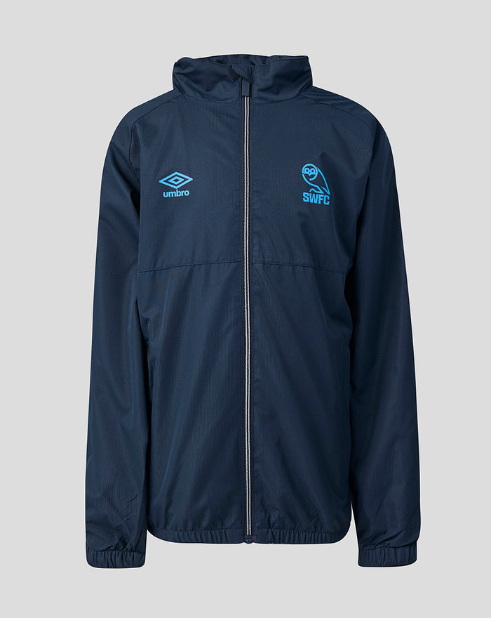 Front view of navy junior training showerproof jacket with blue Umbro logo on the left chest and SWFC crest on the right chest