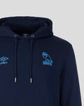 Navy hoodie chest close-up showing Umbro logo on left and SWFC crest on right in blue