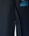 Zipper detail with the SWFC logo on navy training pants