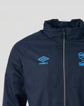 Front view of navy showerproof training jacket with zipper, blue detailing, Umbro logo on left chest and SWFC crest on right.