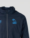 Navy Sheffield Wednesday training jacket close up with SWFC crest and blue Umbro logo on the chest.